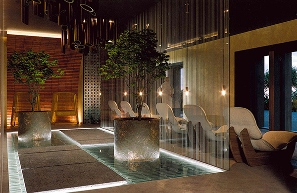 Spazio interno delaa spa con sedie lounge moderne e piscinette